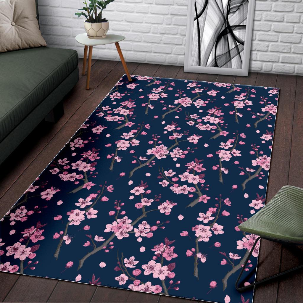 Pink sakura cherry blossom blue background Area Rug