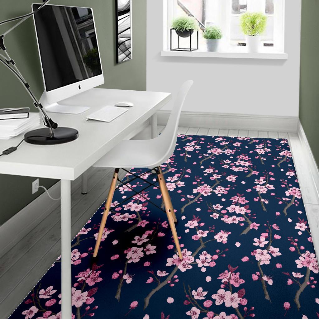 Pink sakura cherry blossom blue background Area Rug