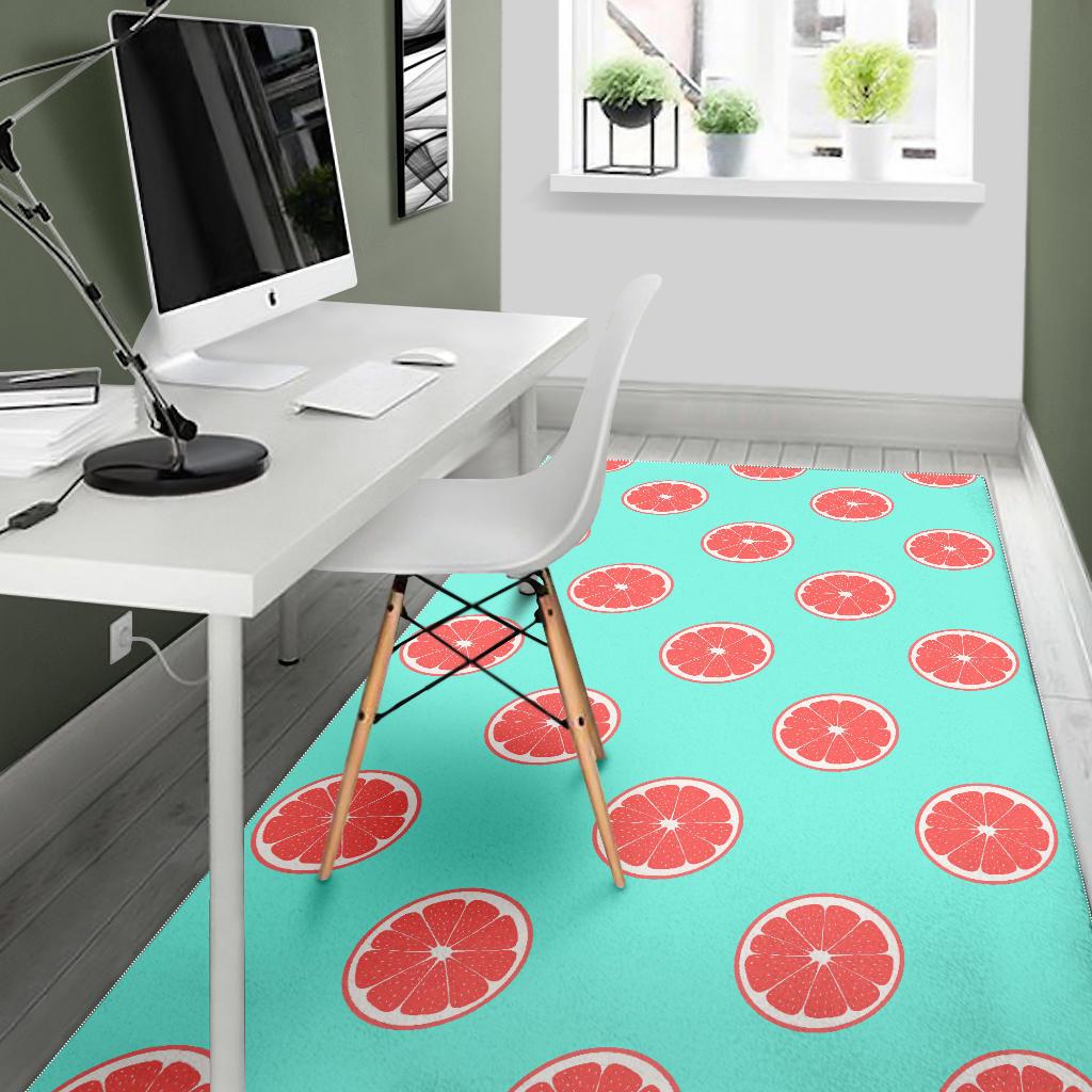 Grapefruit green background Area Rug