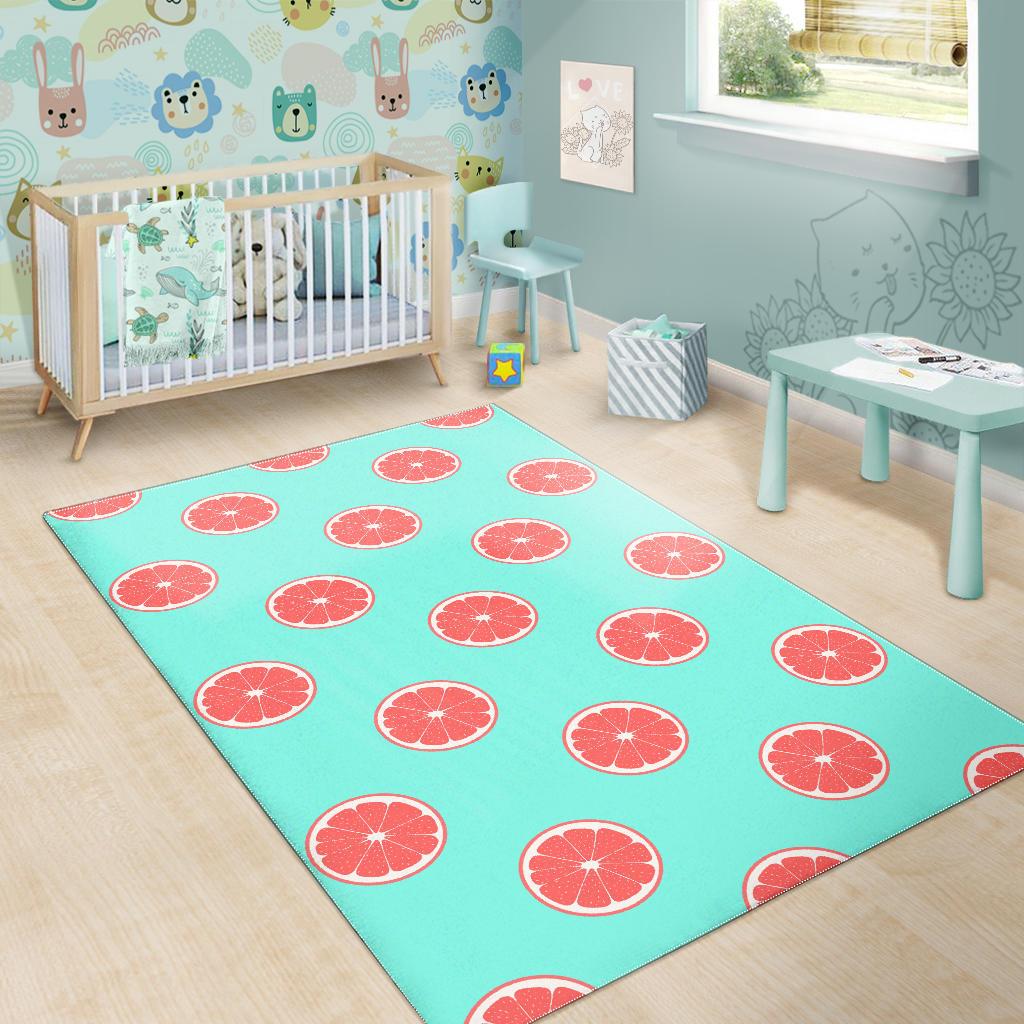 Grapefruit green background Area Rug