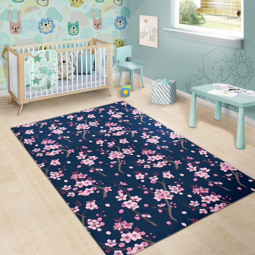Pink sakura cherry blossom blue background Area Rug