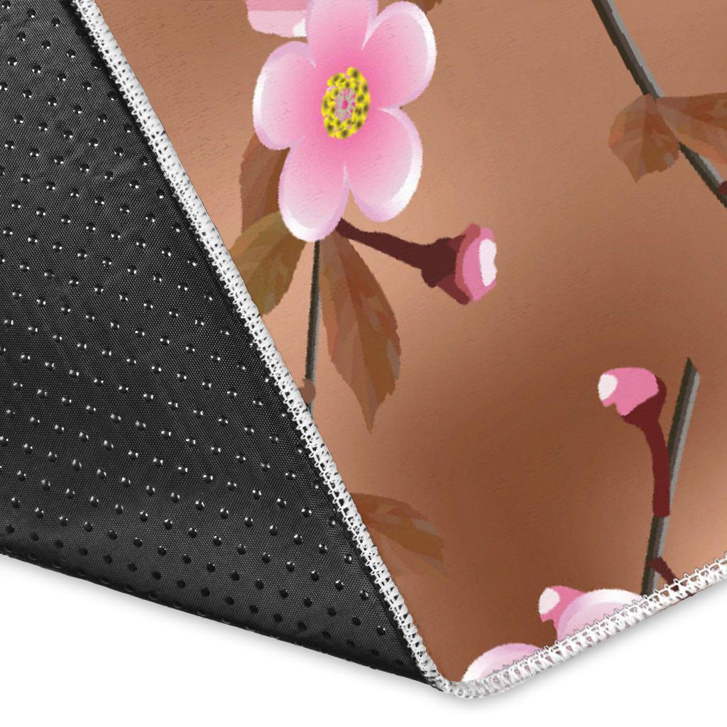 Pink sakura cherry blossom drak brown background Area Rug