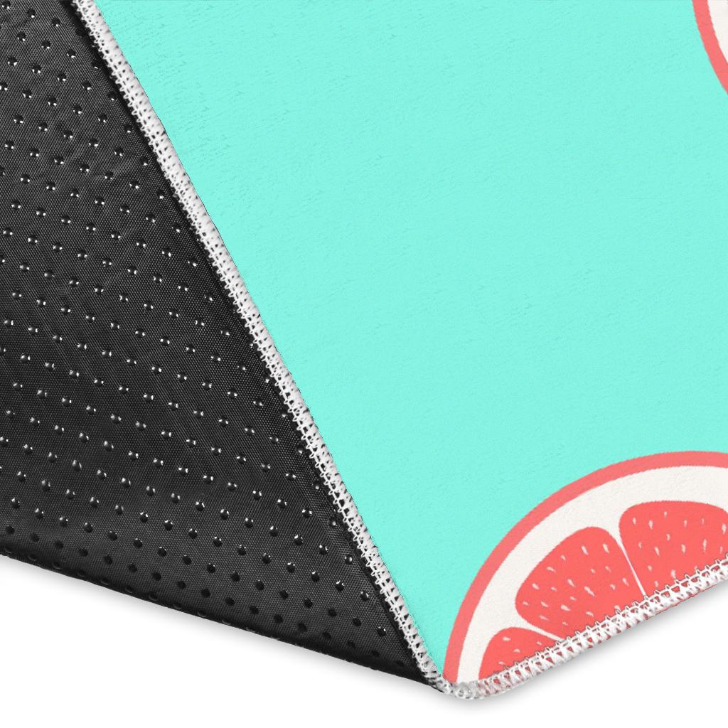 Grapefruit green background Area Rug