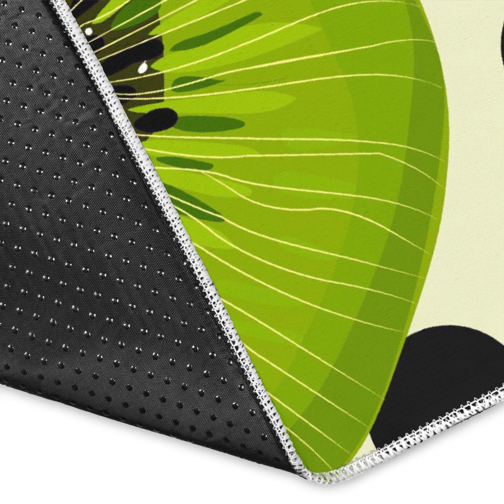 kiwi black dot background Area Rug