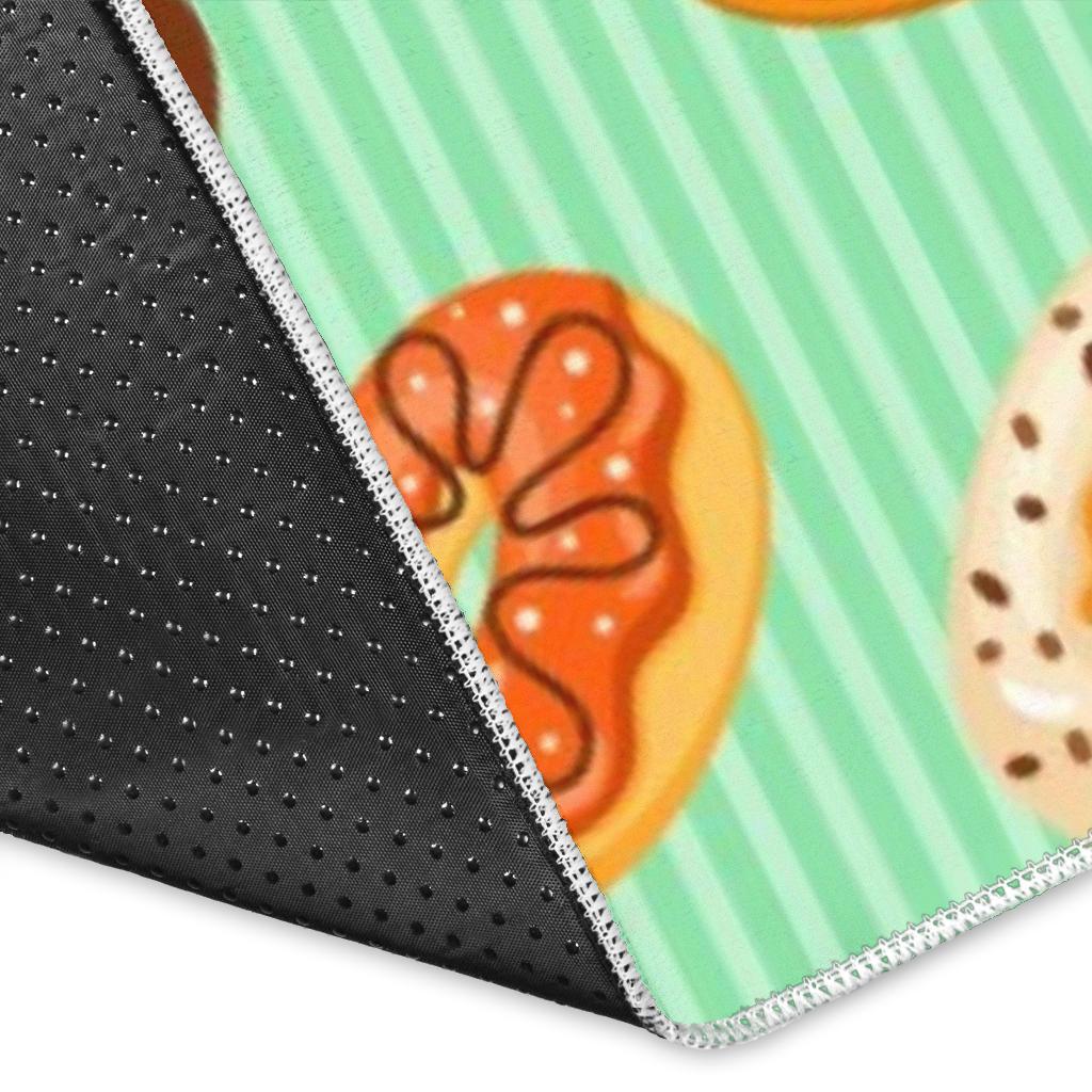 Colorful donut pattern green background Area Rug