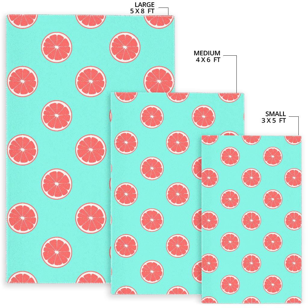 Grapefruit green background Area Rug